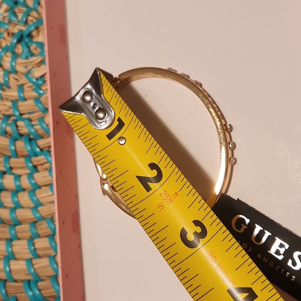 GUESS Gold Bracelet with Clear Stones Logo Accent - Picture 4 of 16